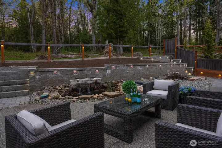 Enjoy peaceful views overlooking lush grounds, koi ponds, and tranquil water features.