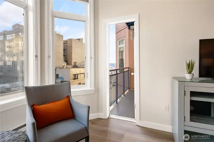 Your private balcony looks out to the downtown skyline and beautiful Puget Sound views to the west. Your private balcony looks out to the downtown skyline and beautiful Puget Sound views to the west.