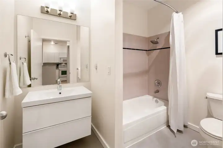 Sleek full bathroom. Sleek full bathroom.
