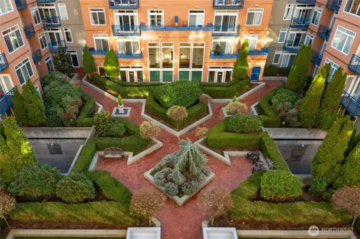 The picturesque courtyard is centered between the two buildings that make up Belltown Court. The picturesque courtyard is centered between the two buildings that make up Belltown Court.