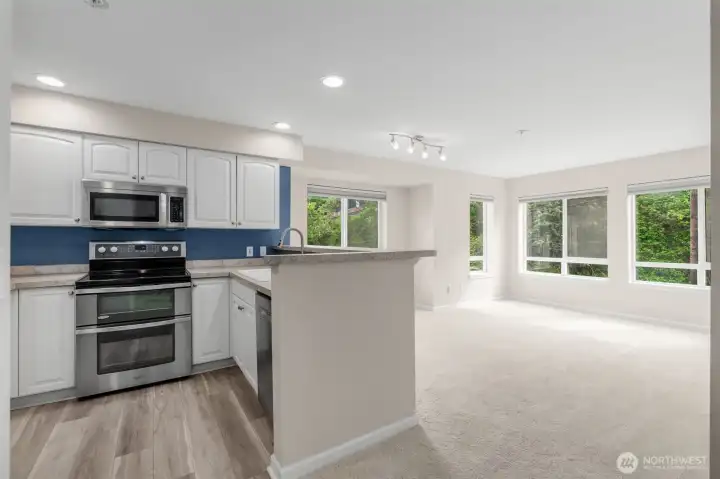 Breakfast bar offers connectivity to living spaces