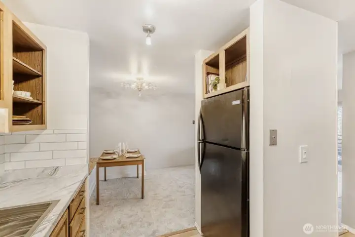 Updated lighting in the kitchen and dining room.  New carpets in the LR/DR.