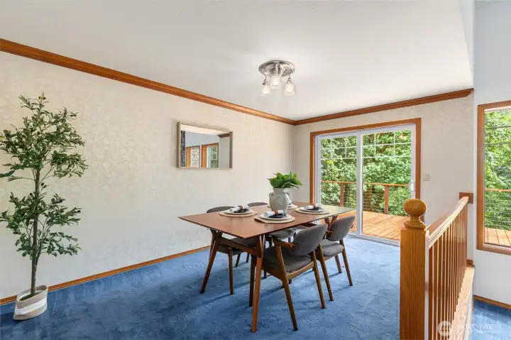 This large dining area accomodates large gatherings and an easy flow between indoor and outdoor entertaining on the large cedar deck. This large dining area accomodates large gatherings and an easy flow between indoor and outdoor entertaining on the large cedar deck.