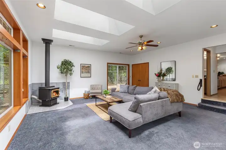 Just two steps down from the kitchen is your huge family room area with... you guessed it, more windows, a slider to the back AND french doors out to the front, also. Just two steps down from the kitchen is your huge family room area with... you guessed it, more windows, a slider to the back AND french doors out to the front, also.