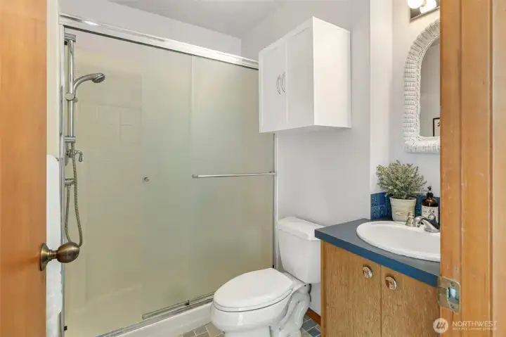 This 3/4 bath is right next to the large family room, which makes it especially comfortable for guests to stay awhile! This 3/4 bath is right next to the large family room, which makes it especially comfortable for guests to stay awhile!