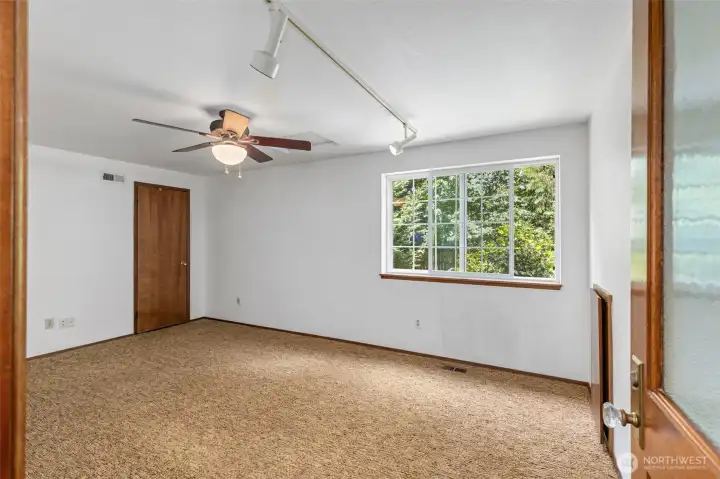 On the opposite end of the upstairs hallway is this fantastic, big bonus room (door is to the attic access). This could easily be an office for 1-2 people or a huge playroom for some lucky little ones! On the opposite end of the upstairs hallway is this fantastic, big bonus room (door is to the attic access). This could easily be an office for 1-2 people or a huge playroom for some lucky little ones!