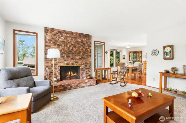 Open-concept living area with large windows that invite plenty of natural light. Open-concept living area with large windows that invite plenty of natural light.