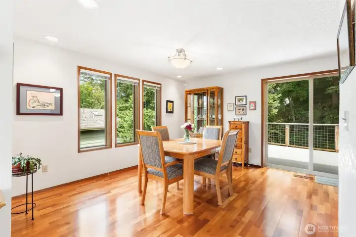 Dining area perfectly situated for easy access to the kitchen and outdoor deck. Dining area perfectly situated for easy access to the kitchen and outdoor deck.