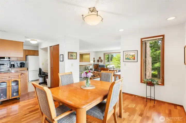 Seamless flow between the dining room and kitchen, ideal for entertaining. Seamless flow between the dining room and kitchen, ideal for entertaining.