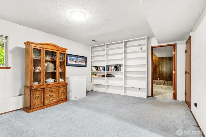 Lower level hallway leading to the expansive family room. Lower level hallway leading to the expansive family room.