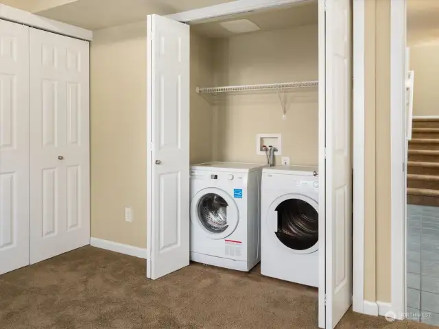 The laundry area could hold full size washer and dryer