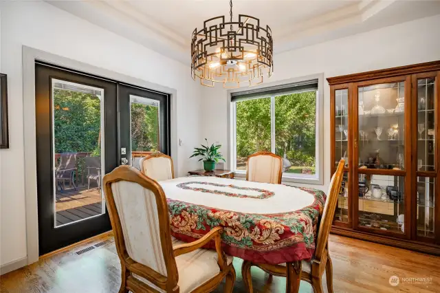 Dining room with french doors leading to deck.