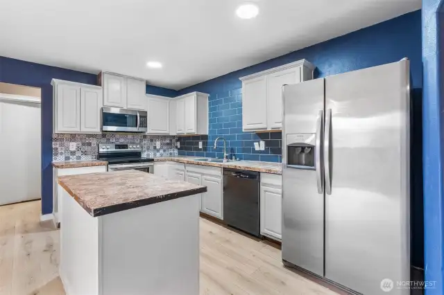 This is a well utilized and organized kitchen space.