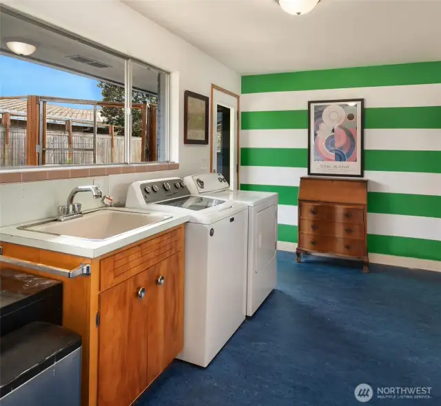 Laundry room is huge with outdoor and garage access