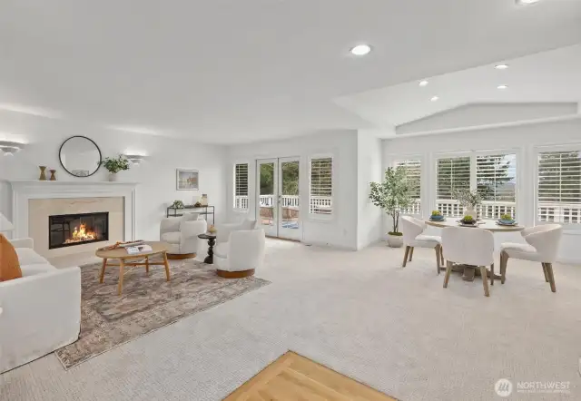 Greeted with vaulted ceilings and natural light