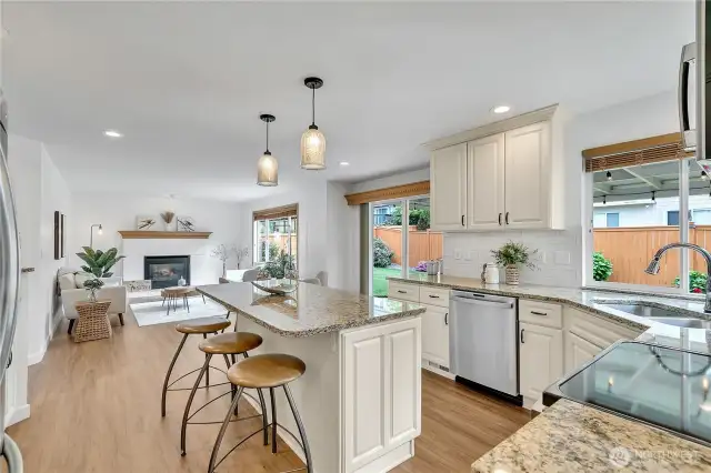 This space seamlessly blends elegance and functionality for an exceptional cooking and gathering experience.