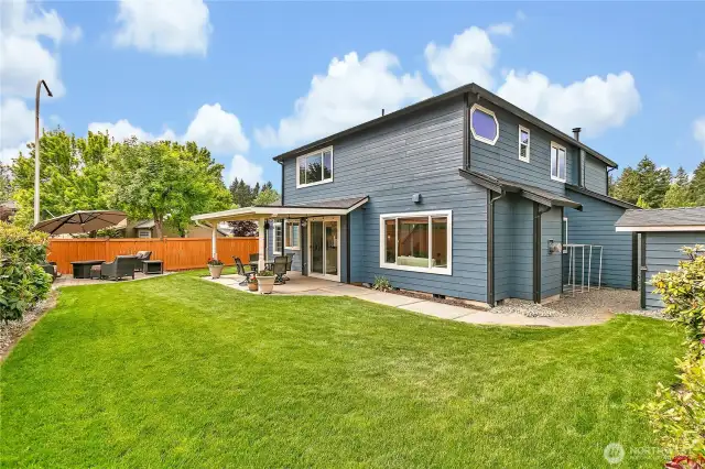 To the right, an 8x8 ft storage shed provides additional space for tools, equipment, and seasonal storage. The Rainbird seven-zone sprinkler system—complete with a Rachio smart controller—ensures the entire front and backyard stays lush and green all year round with effortless watering.