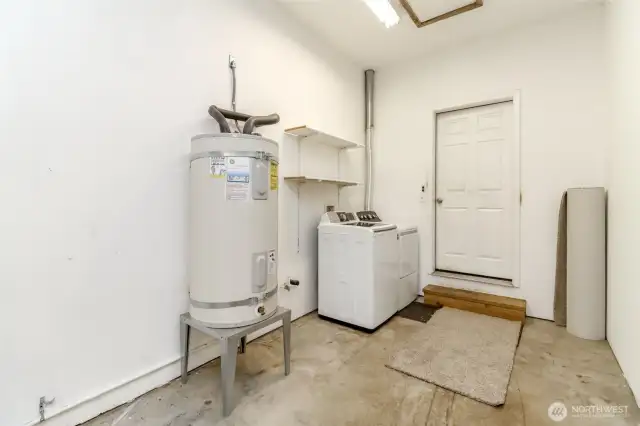 Utility/laundry space in garage.