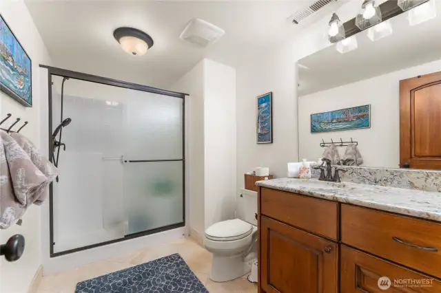 Downstairs bathroom with walk in shower