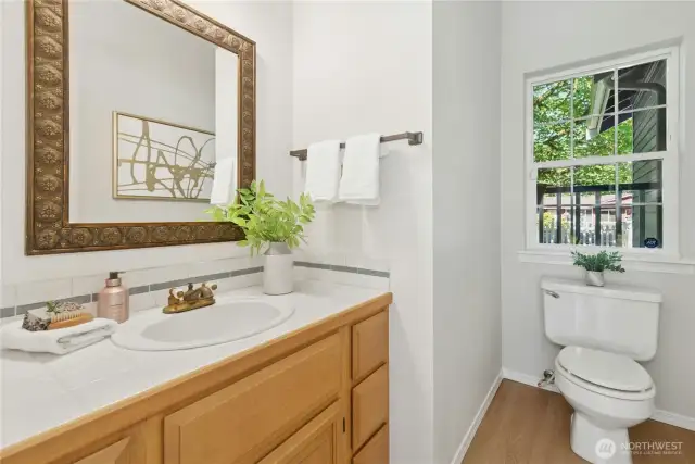 Powder room on main with new paint and carpet.