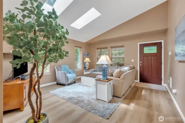 open, spacious living room.  Notice the skylights