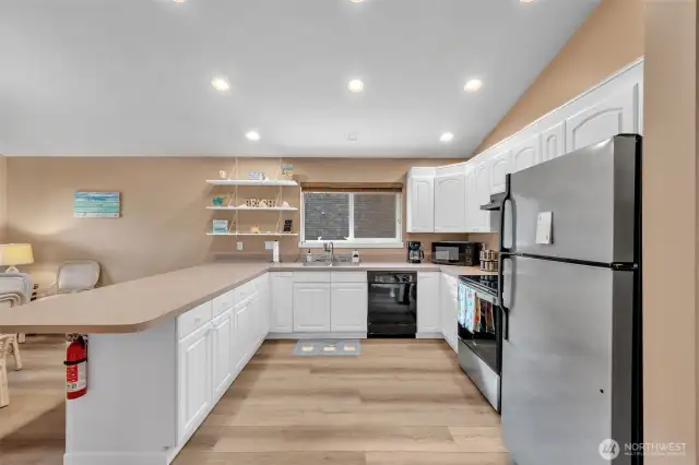 Super big kitchen open to large spacious area for eating or lounging