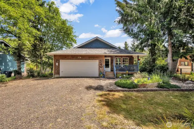 One more look at the front of this home complete with all the extra parking