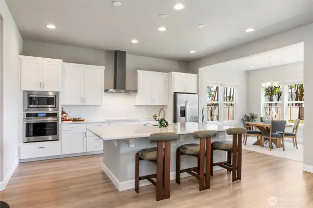 Beautiful gourmet kitchen with quartz countertops