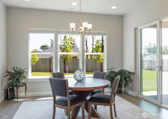 Lovely sunroom that can be used as dining room, or glorious place to watch the sunrise. Slider off the sunroom give you access to the backyard and patio