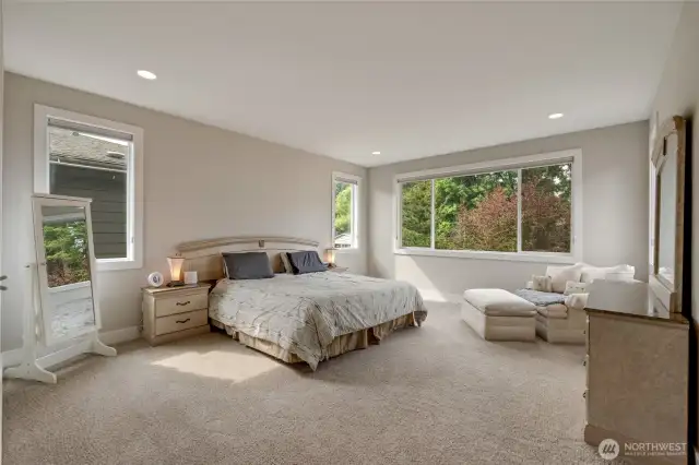 Luxurious Primary Suite with oversized walk-in & spa like private bath.