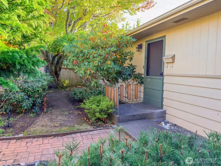 Streetside Front Gate opens to a Large Inviting Courtyard.