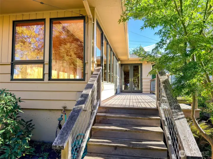 Large Deck parallels the luscious Sunroom.