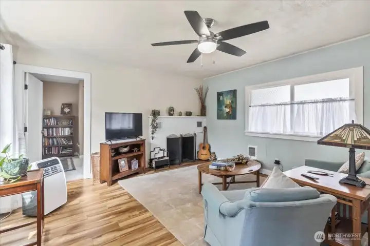 Inviting Living Room: Bright and airy with abundant natural light—perfect for relaxing or entertaining.