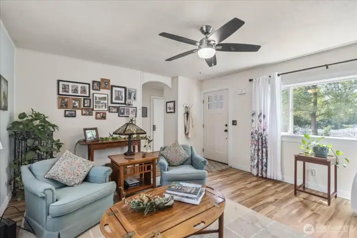 Inviting Living Room: Bright and airy with abundant natural light—perfect for relaxing or entertaining.