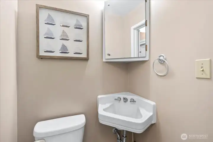 Half bath in Primary Suite with new sliding door