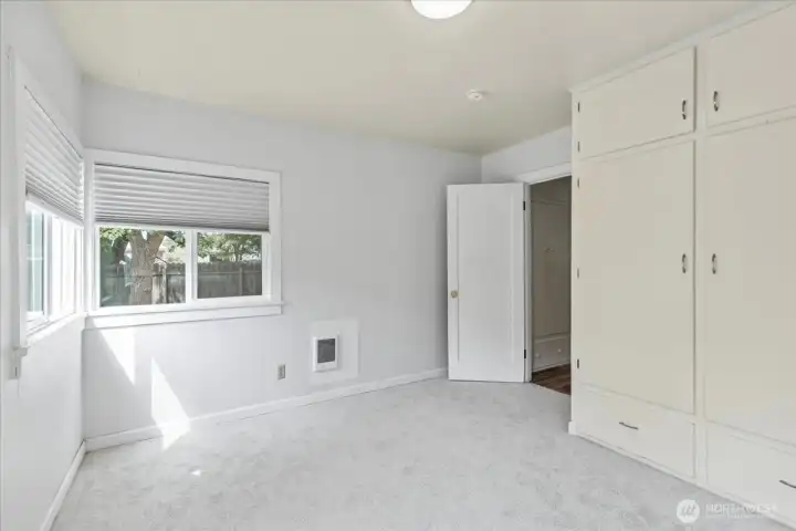 Bedroom 2- charming built- in storage