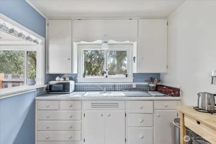 Charming Kitchen: Functional with vintage character and space to make it your own.