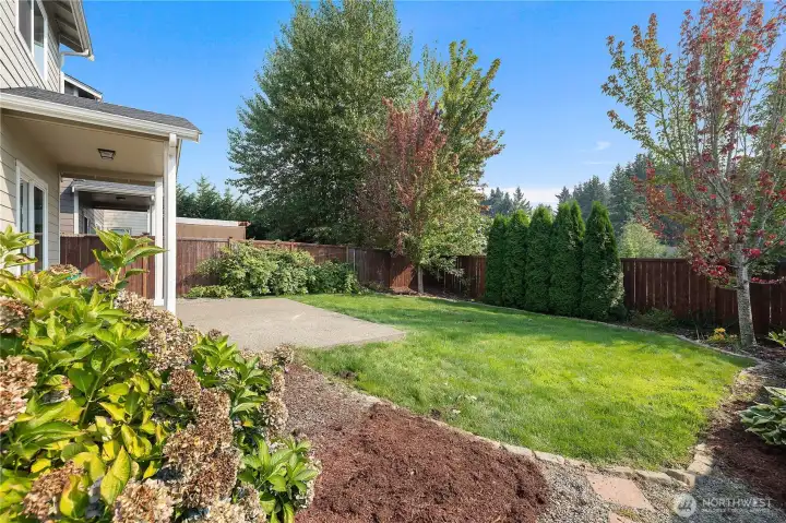 The fully fenced backyard features a sprinkler system and a cozy covered patio, creating a great space for barbequing and entertaining. With no homes behind you, it offers wonderful privacy and easy low maintenance upkeep.