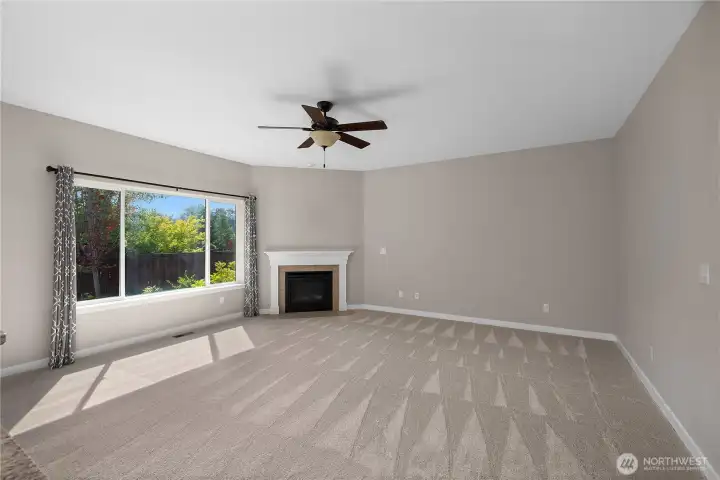 The main floor showcases new carpet in a thoughfully maintained one-owner home awaiting its new owners.