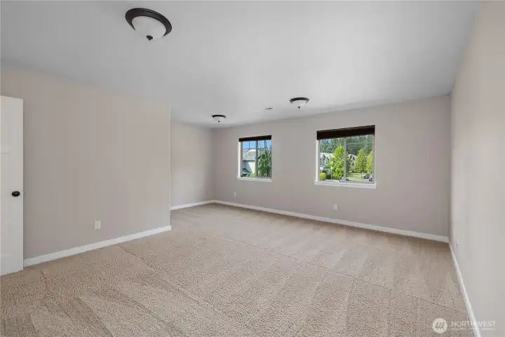 Huge bonus room above the garage adds valuable living space, ideal for a bedroom, rec or multipurpose area.