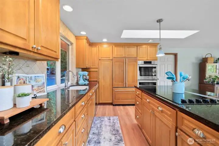 You’ll love the generous counter space and abundant cabinetry for all your cooking needs