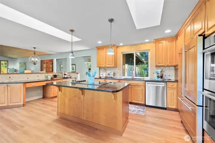 Built-in desk area to the left, with the same tile backsplash carried over for a cohesive design