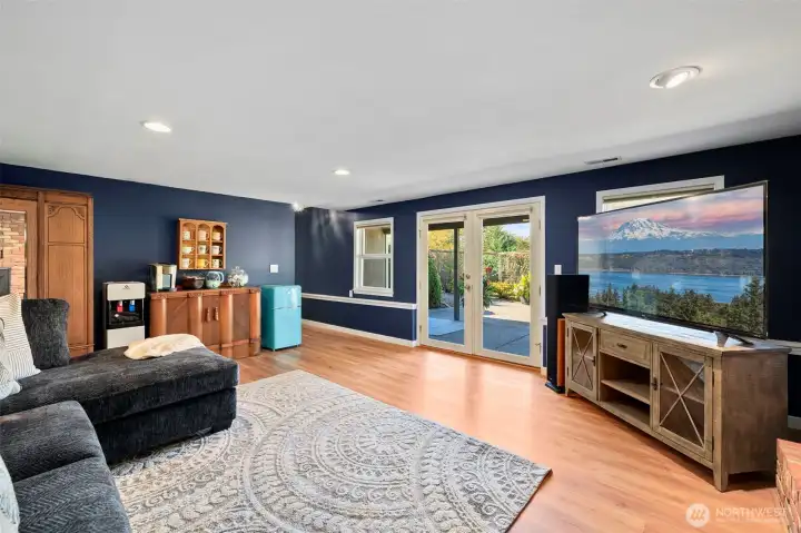Step through French doors to your private lower-level patio oasis