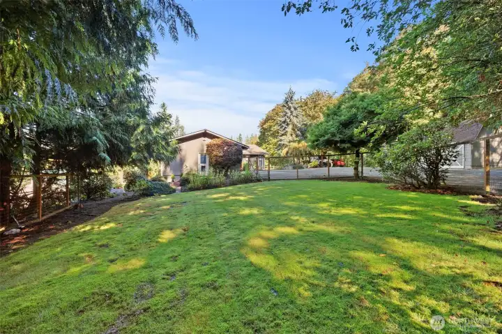 Ideal fenced backyard for pets, gardening, and private gatherings