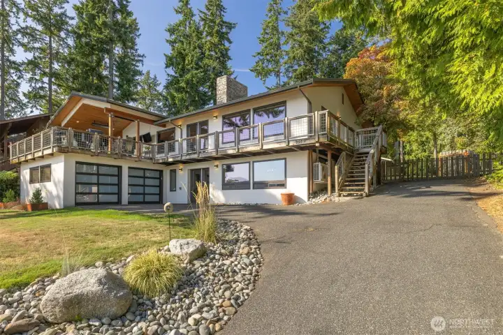 Wonderful waterfront home on quiet street , shop and large lot.