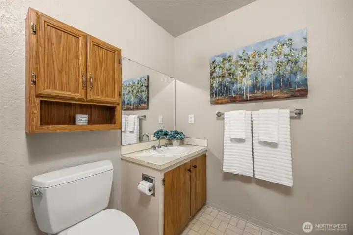 Lower level 1/2 bath and utility room.