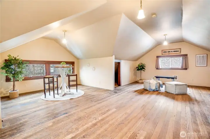 The added space in the eaves provides ample storage, while three sets of windows flood the third floor with plenty of natural light.