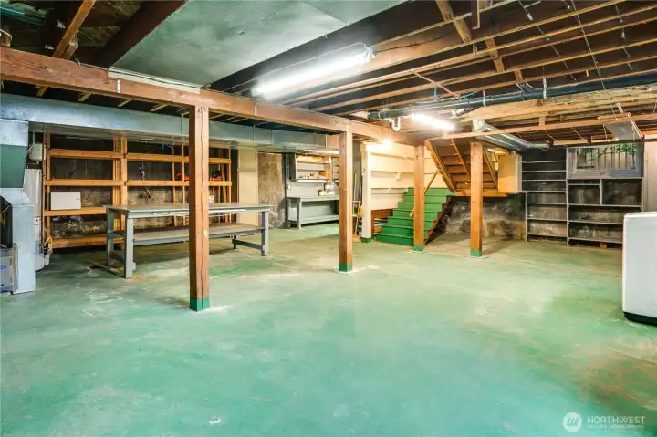 The basement boasts over 1,020 square feet, complete with a workbench, storage shelving, and the potential for additional finished space. A new furnace and heat pump were installed in 2023 for improved efficiency, and the electrical panels were updated in 2022.