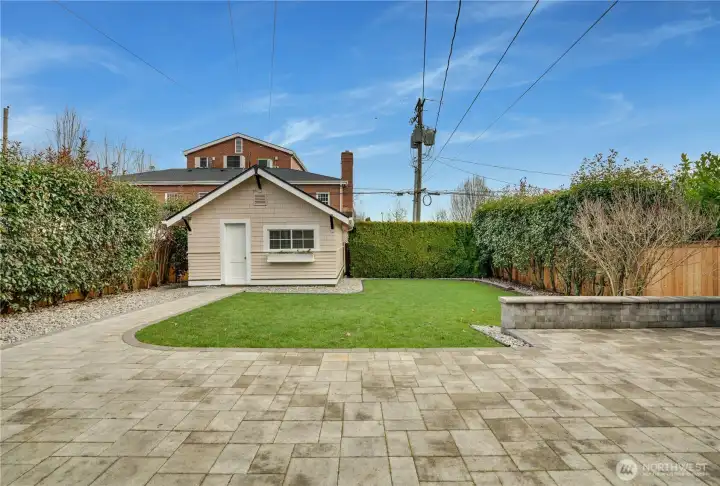 The backyard offers plenty of space for play, and for urban gardeners, it’s perfect for adding garden beds to grow your own fresh produce. The charming detached garage provides both parking and extra storage.
