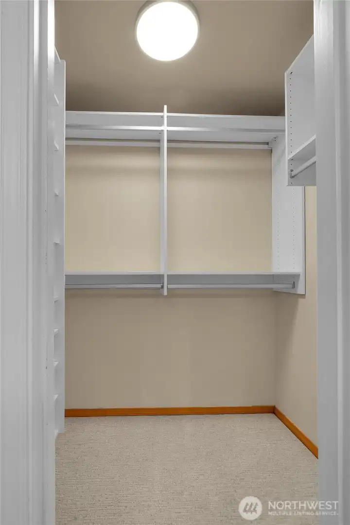 3/4 en-suite bathroom off primary with heated floors and walk in closet